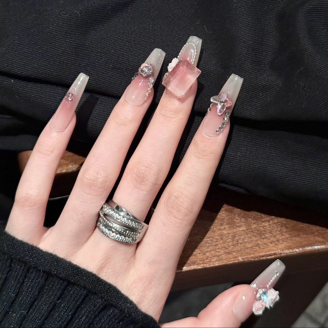 Embrace feminine elegance with the Blush Bloom Press-On Nails, a delicate yet luxurious set inspired by romantic florals and soft pink hues. This design blends dreamy ombré shades with intricate 3D embellishments, creating a look that’s both graceful and enchanting.