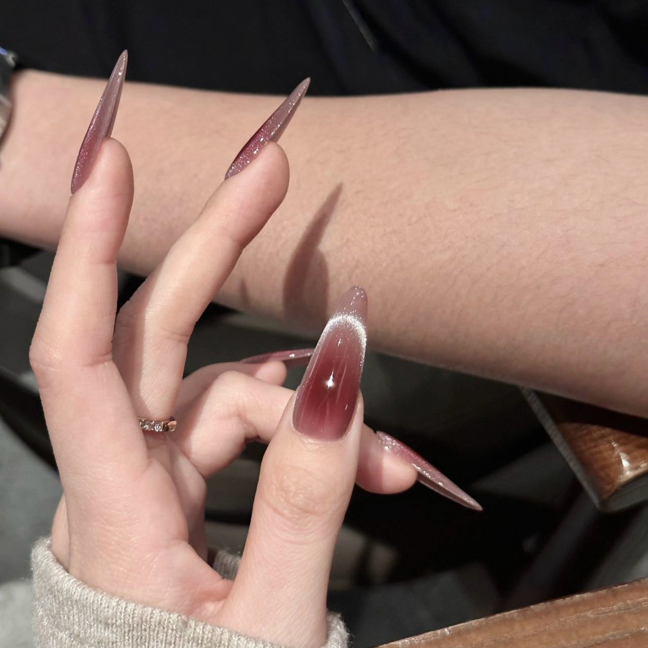 Indulge in understated luxury with Mocha Mystique Press-On Nails. These extra-long stiletto nails feature a rich mocha-toned cat-eye effect, blending seamlessly into a soft ombré for a sultry yet sophisticated look. The magnetic shimmer adds depth and dimension, creating an alluring, velvety finish that catches the light with every movement.