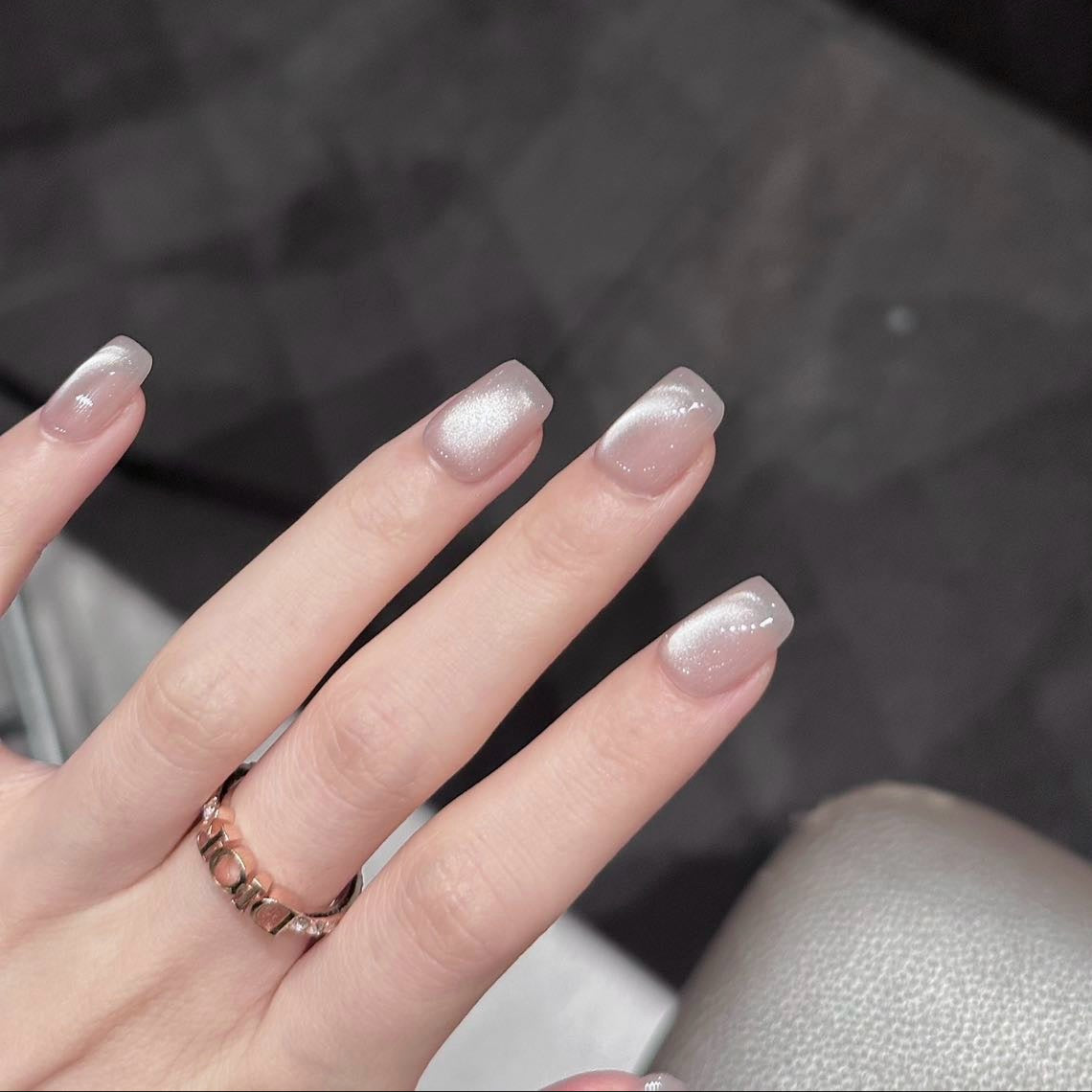 Embrace subtle elegance with Moonlit Pearl Press-On Nails, a stunning blend of soft champagne shimmer and delicate pearlescent glow. This sophisticated set features a graceful short square shape with a glossy, luminous finish that catches the light beautifully, creating an ethereal, moonlit effect. Perfect for those who love a minimalist, refined aesthetic, Moonlit Pearl brings understated luxury to your fingertips.